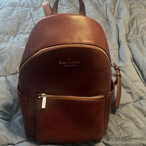 Kate Spade medium dome backpack in cherrywood. Great condition!